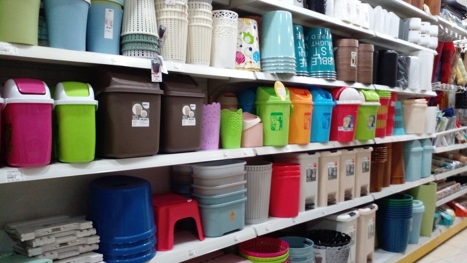 A store filled with lots of different colored cups